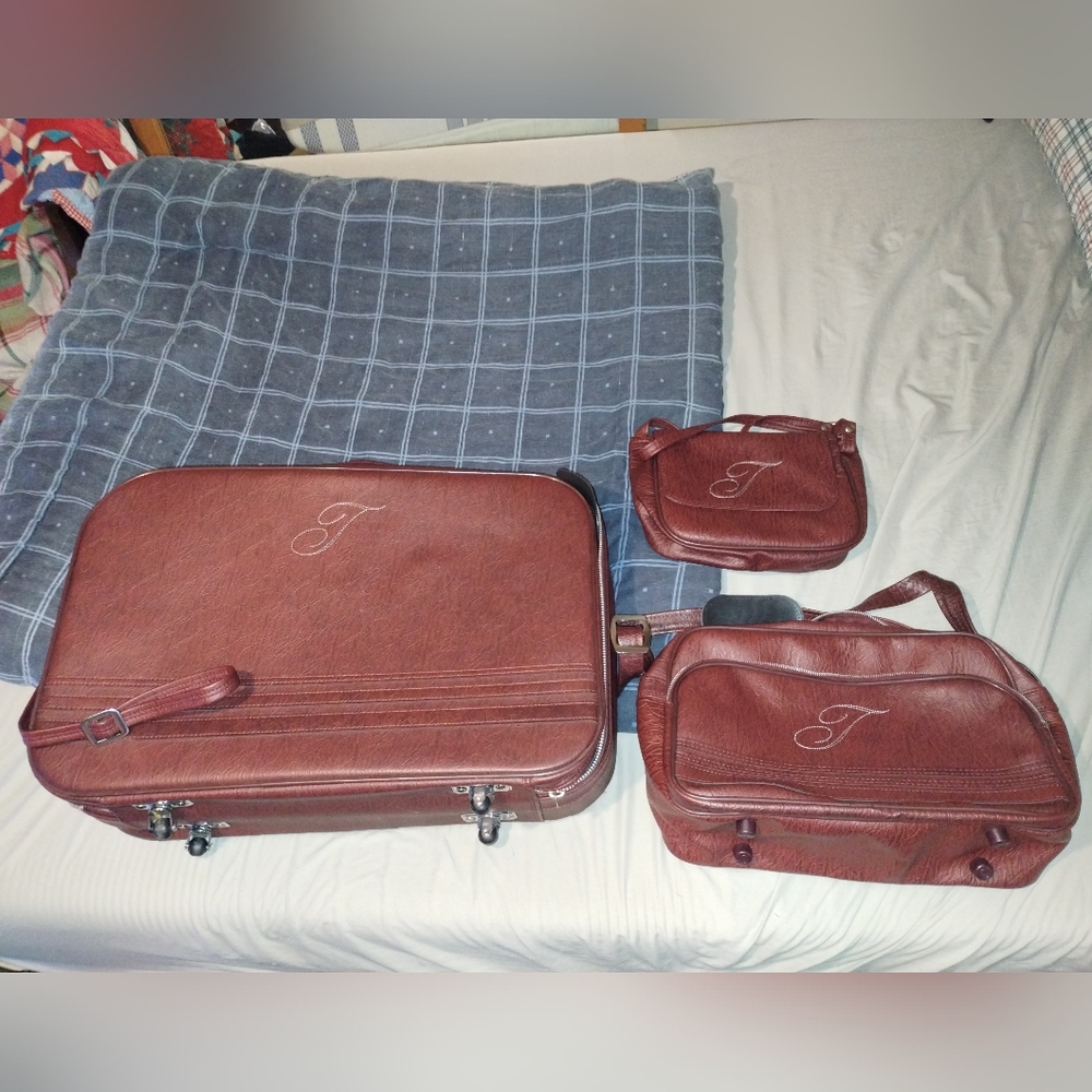 Vintage three-piece all leather travel suitcase in like new condition